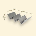 Stainless steel taco holder, 23 cm long, with three slots, 10 cm wide and 5 cm high.