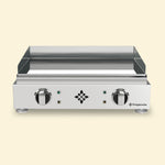 Vivaplancha electric griddle in stainless steel, front view, with two control knobs, smooth plate and raised edges.