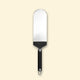 Large stainless-steel fish spatula with a black handle, shown on a beige background.